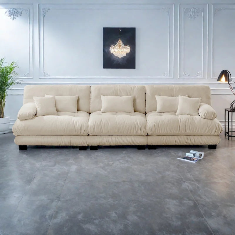 Canapé 4 places avec accoudoirs ronds à traversin, coussins d'assise profonds